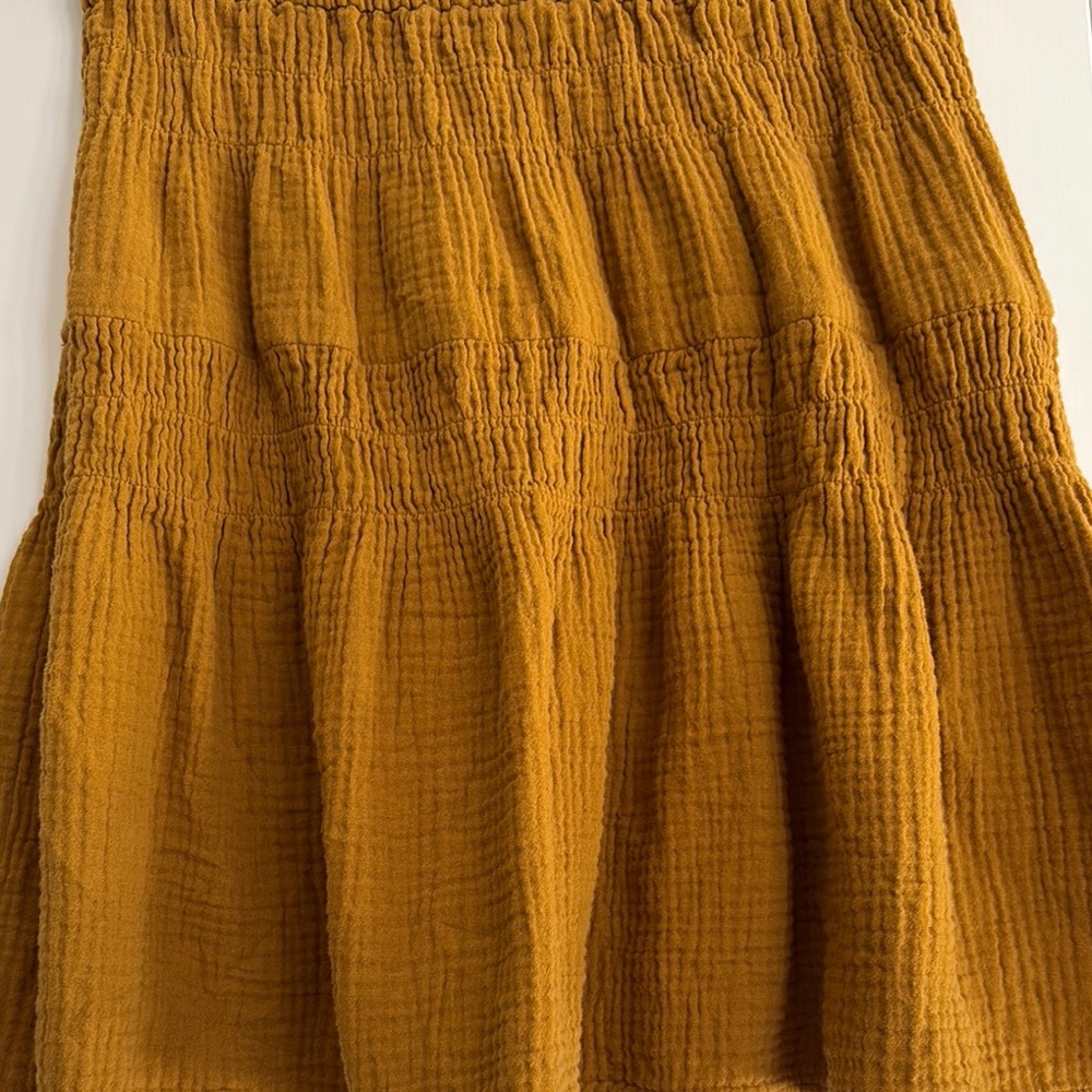 Madewell Double Gauze Smocked Mini Skirt in Mustard. - Picture 3 of 5